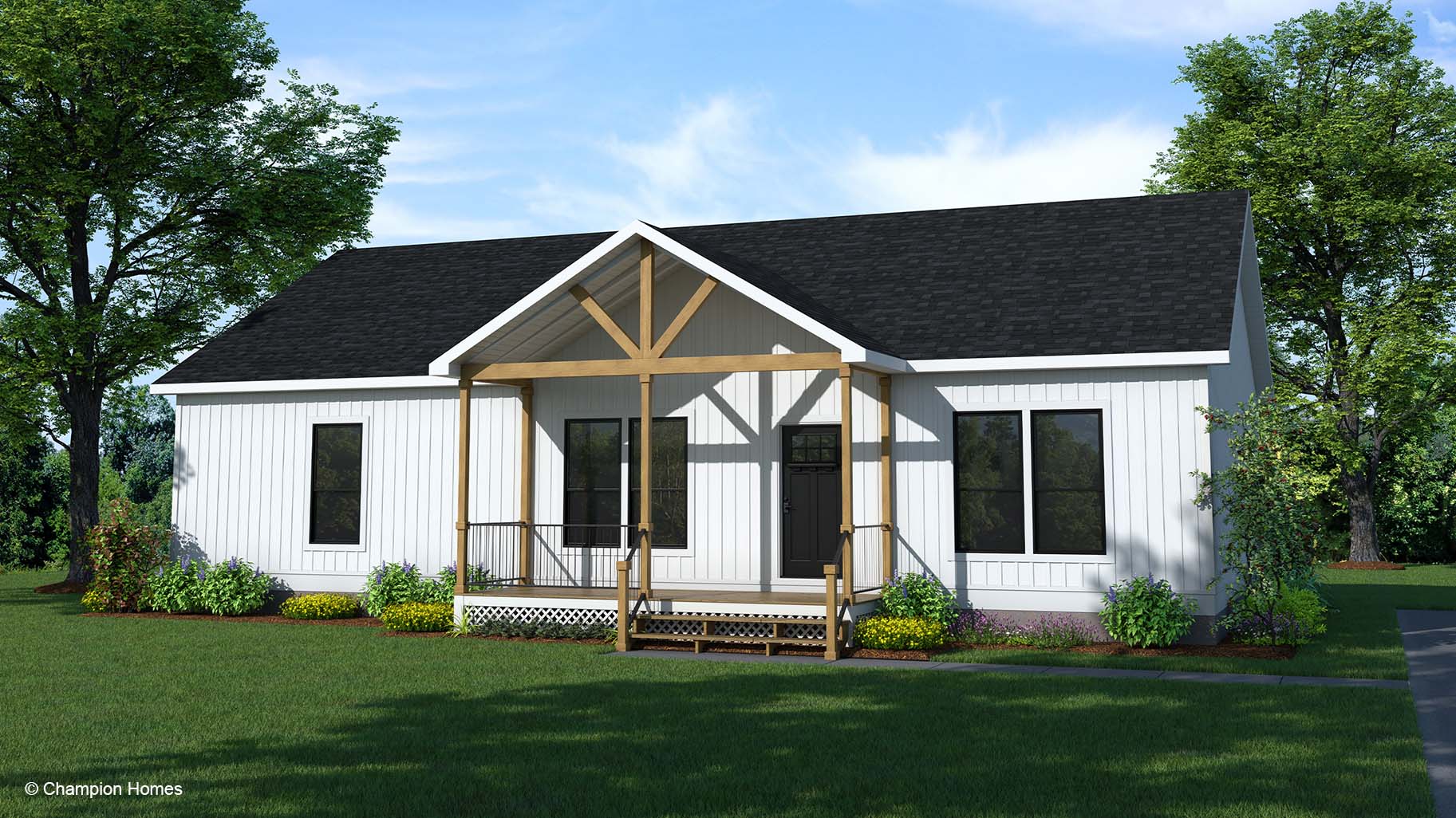 White modern farmhouse modular home with a covered front porch, black windows, and landscaped green lawn and trees.