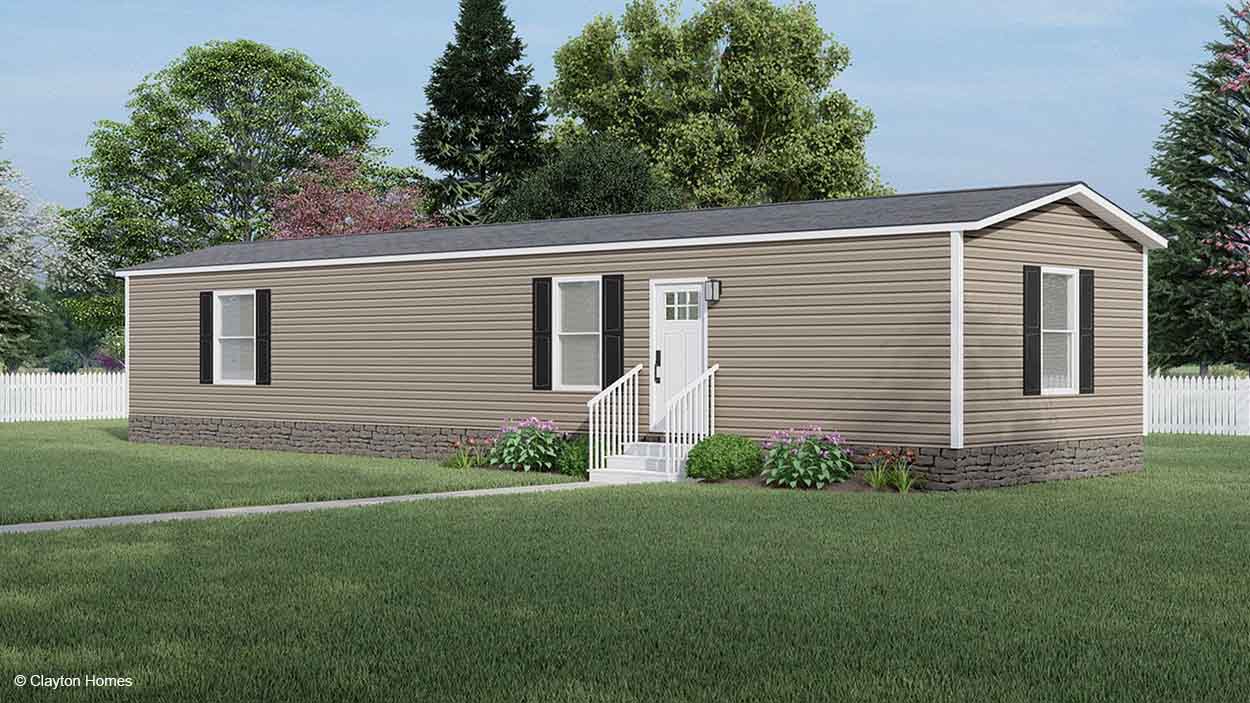 A beige manufactured home rendering with black shutters, white trim, and steps, surrounded by grass and trees.